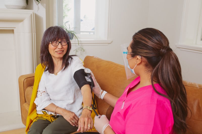 Nurse Next Door client having blood pressure checked.