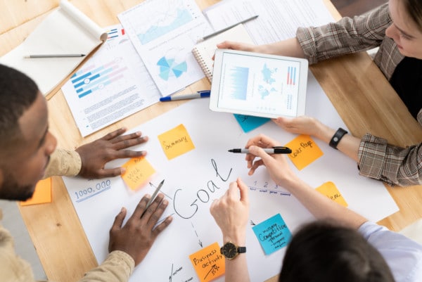 a team working together to craft a home care business plan